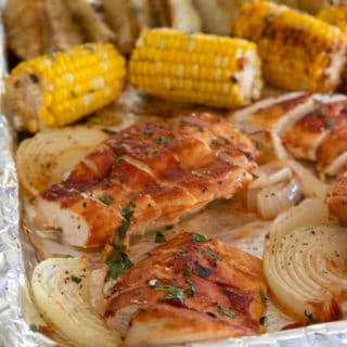 chicken corn and potatoes on a sheet pan