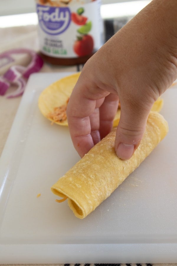 rolling baked taquito