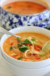 Thai coconut soup in a white bowl
