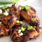 marinated chicken thighs on a plate