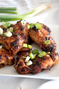 marinated chicken thighs on a plate