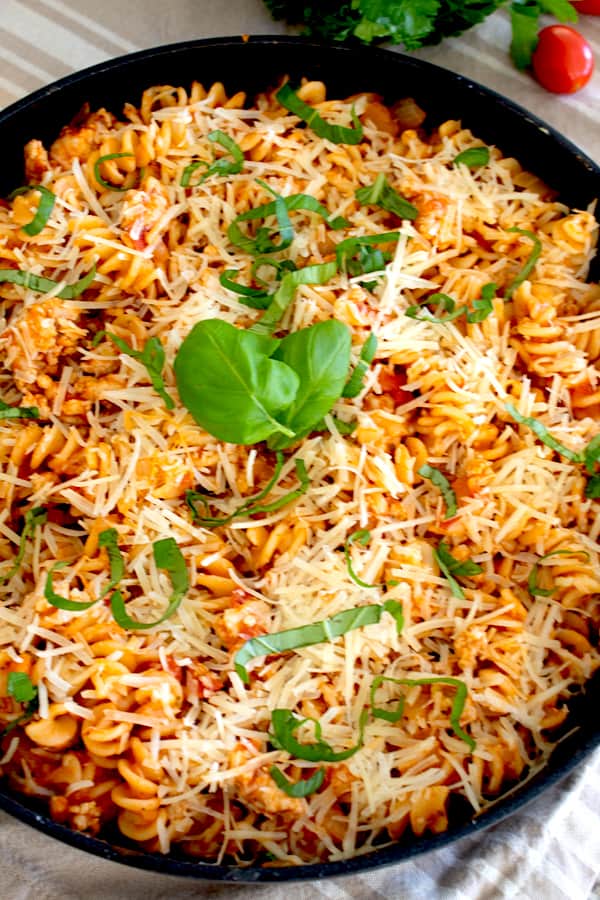 overhead shot of ground chicken pasta skillet