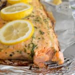 corner view of marinated salmon on piece of foil