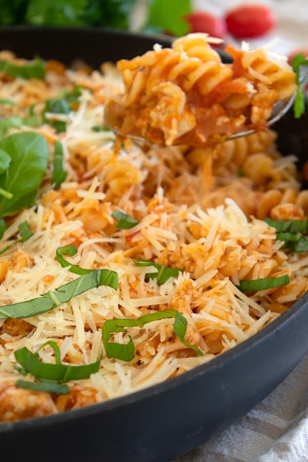 spoonful of pasta in a skillet