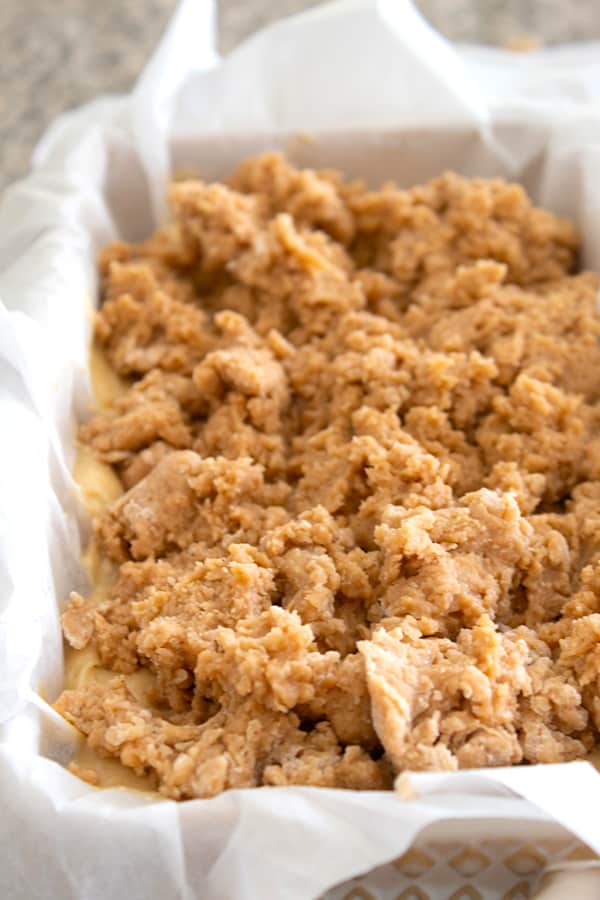 apple bread with streusel topping in a pan before baking