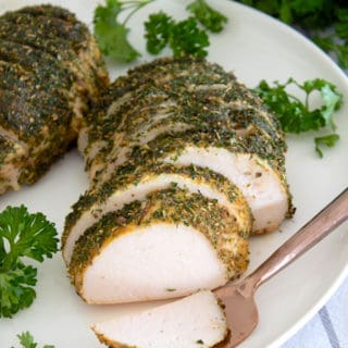 sliced turkey tenderloin on plate