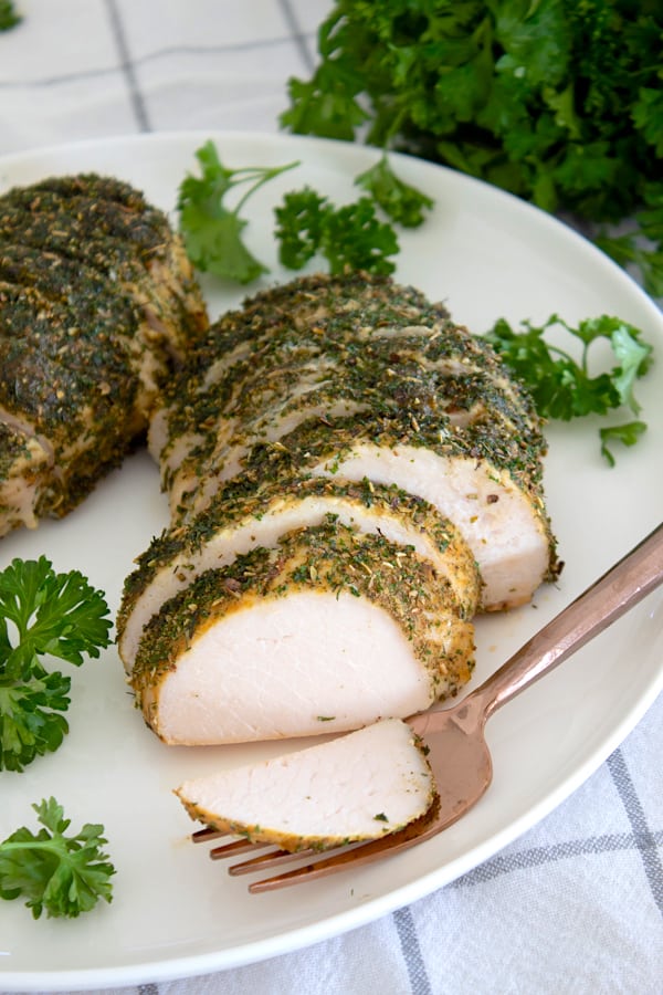 sliced turkey tenderloin on plate