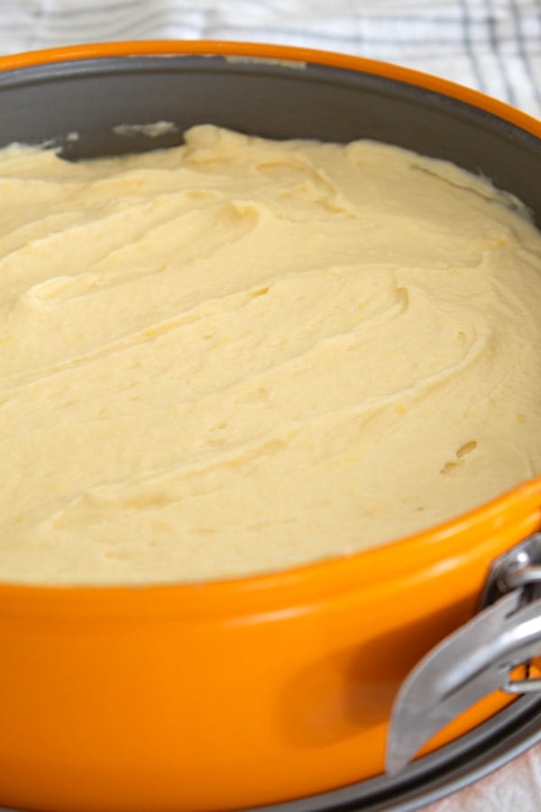 lemon ricotta cake batter in a springform pan