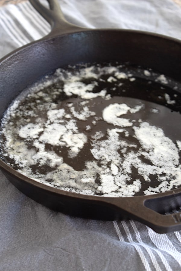 melted butter in cast iron skillet