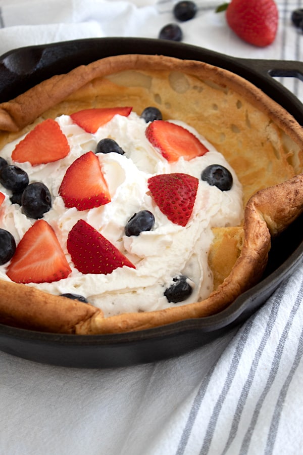 dutch baby with berries and cream