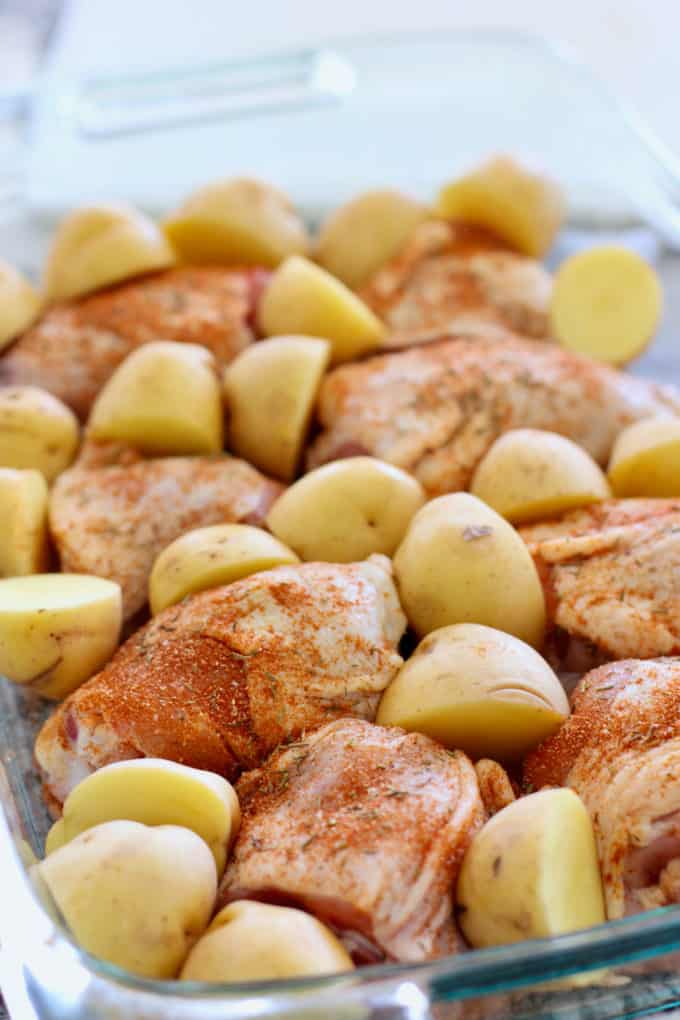 chicken rubbed with spices and potatoes