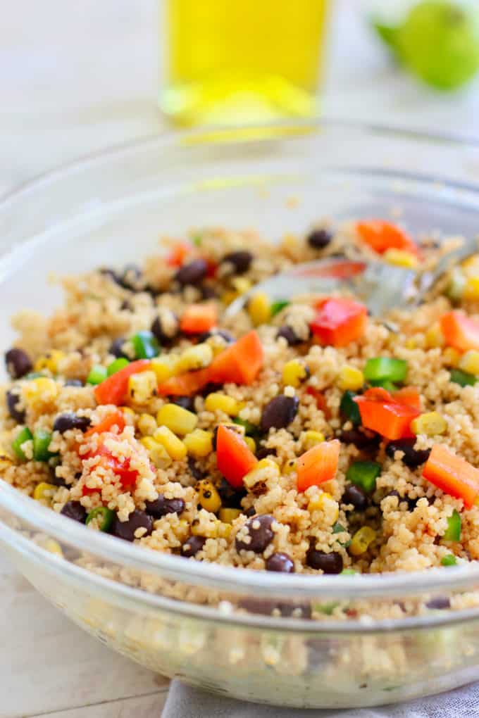 Couscous Salad with black beans in a clear bowl