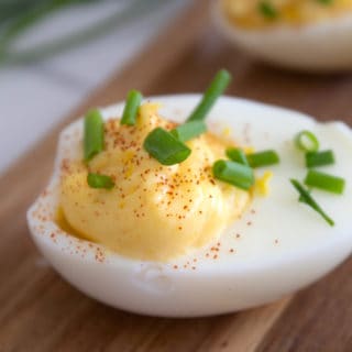 deviled egg with paprika and chives