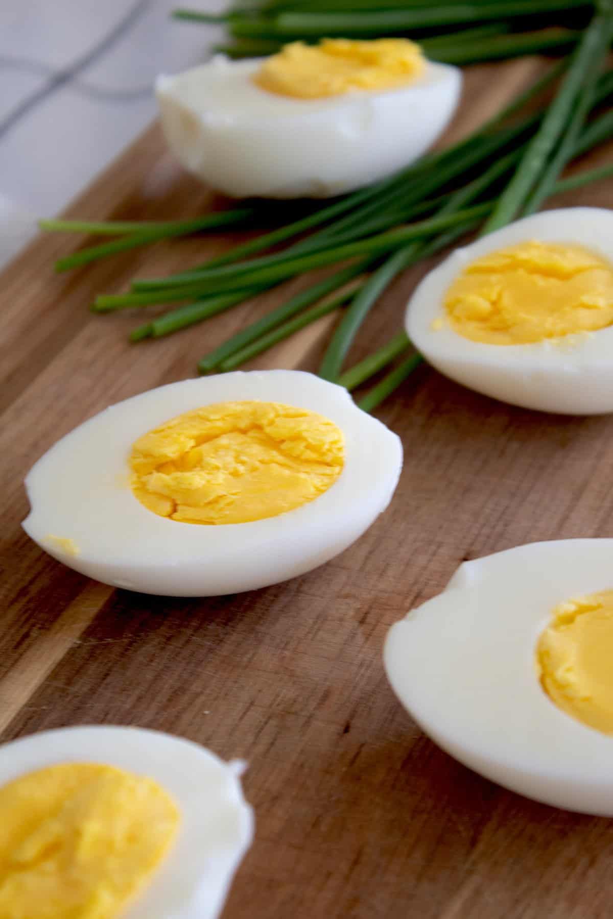 picture of hard boiled eggs on cutting board