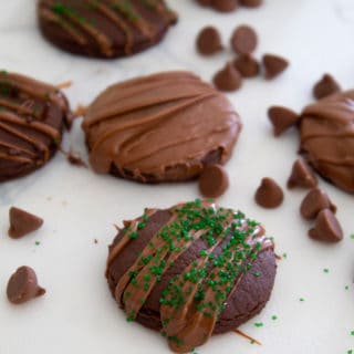 overhead view of thin mint cookies garnished with green sprinkles