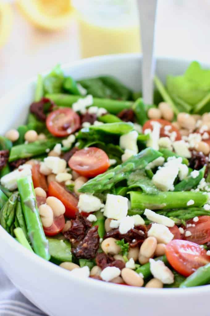 asparagus salad in a white bowl