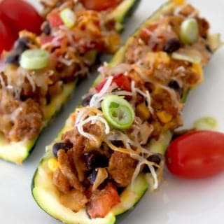 cooked taco boat on a white plate