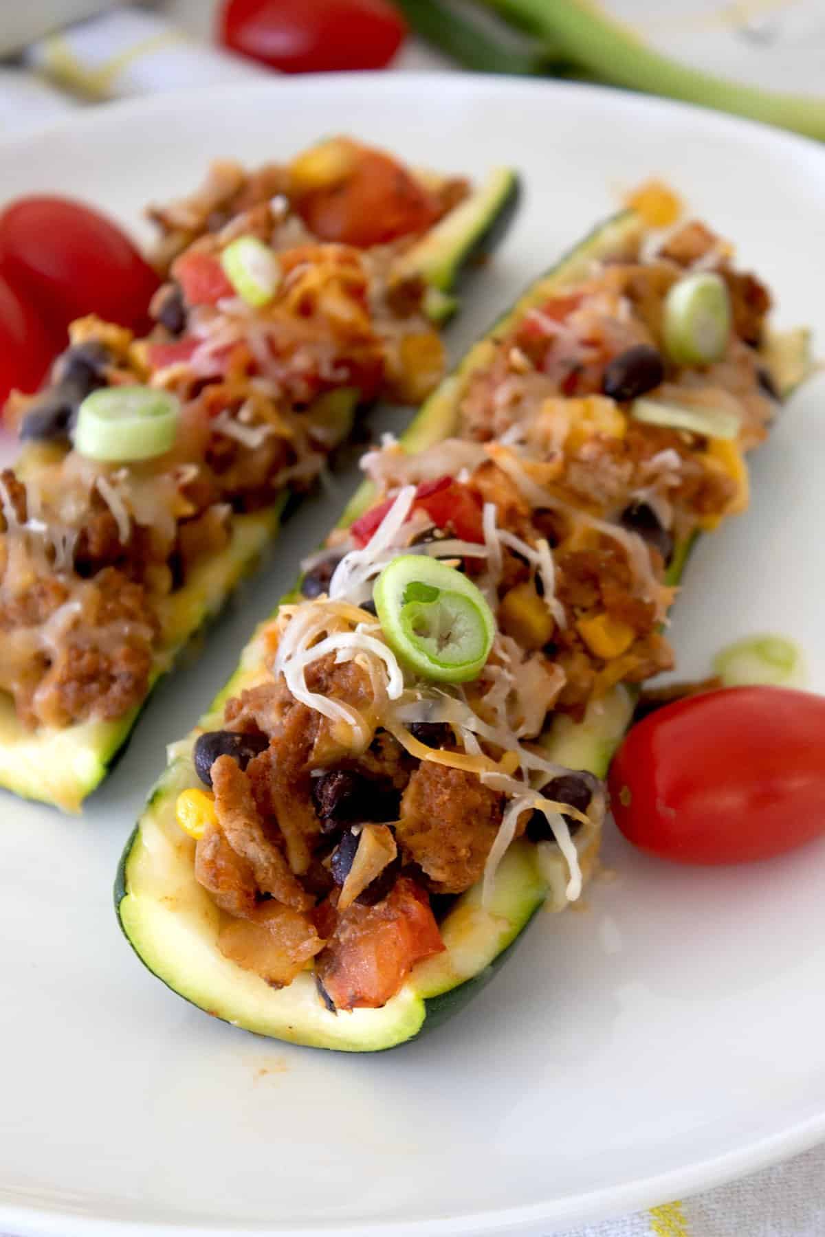 cooked taco boat on a white plate