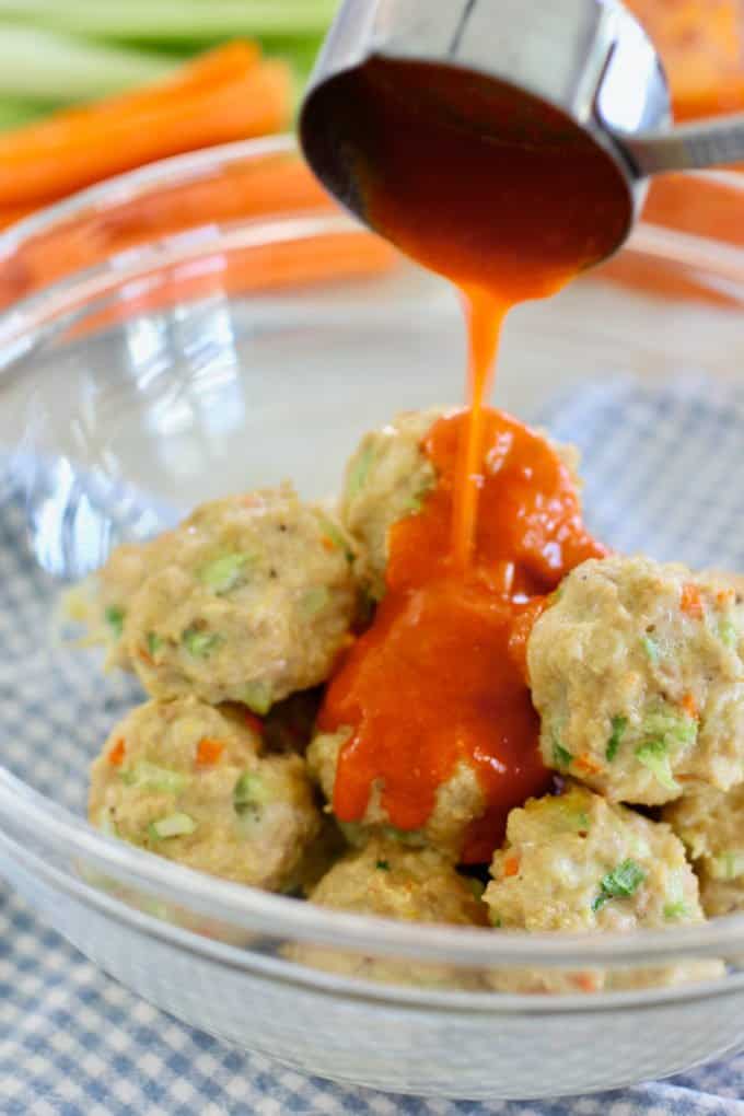 toss buffalo sauce and meatballs