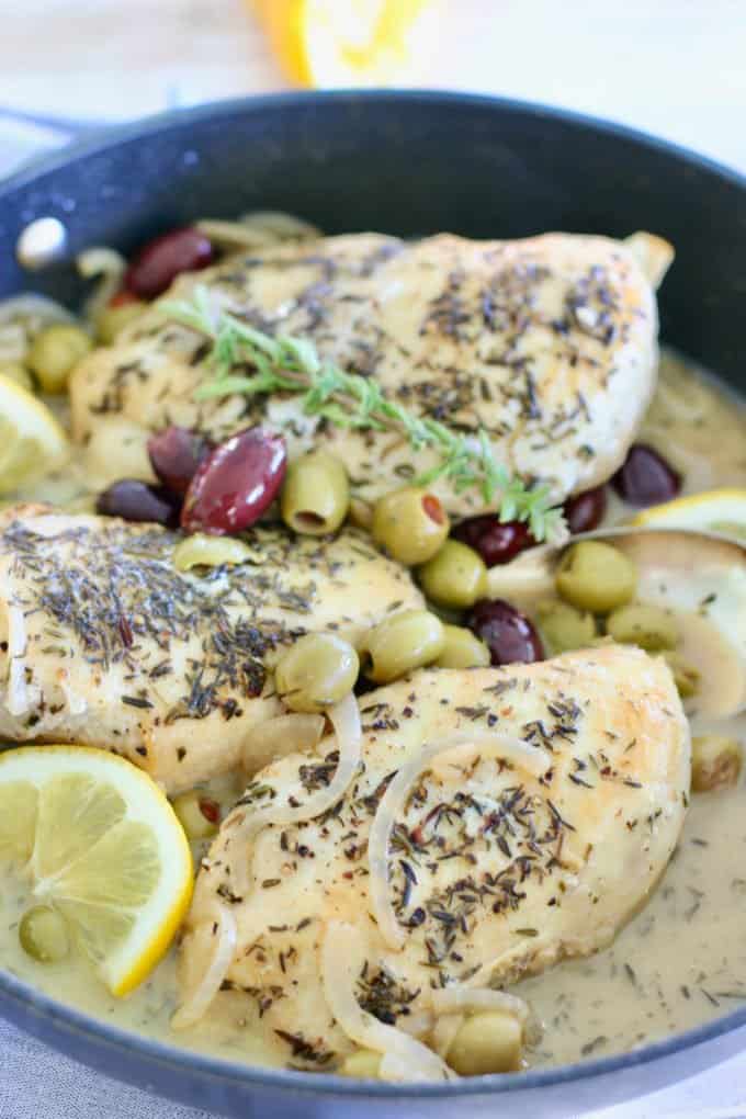 chicken and olives in a skillet