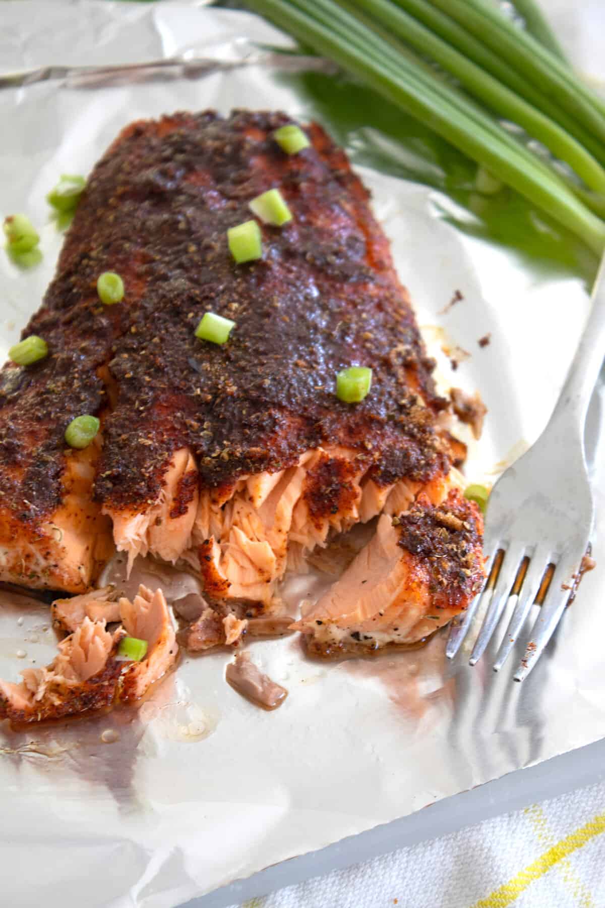 blackened salmon filet on foil