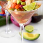 front facing shot of shrimp cocktail Mexican style in a martini glass