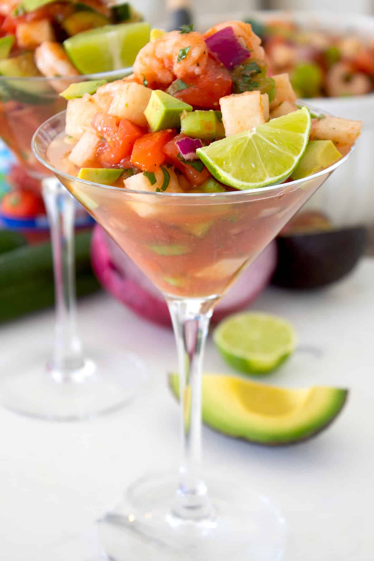 front facing shot of shrimp cocktail Mexican style in a martini glass