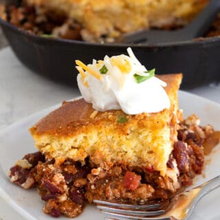 chili cornbread casserole slice on white plate