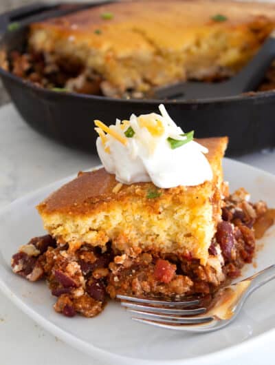 chili cornbread casserole slice on white plate