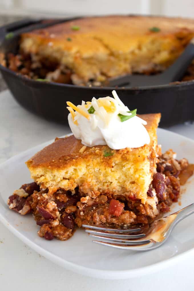 chili cornbread casserole slice on white plate