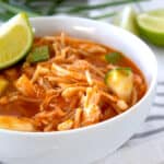 bowl of soap de fideo with lime garnish
