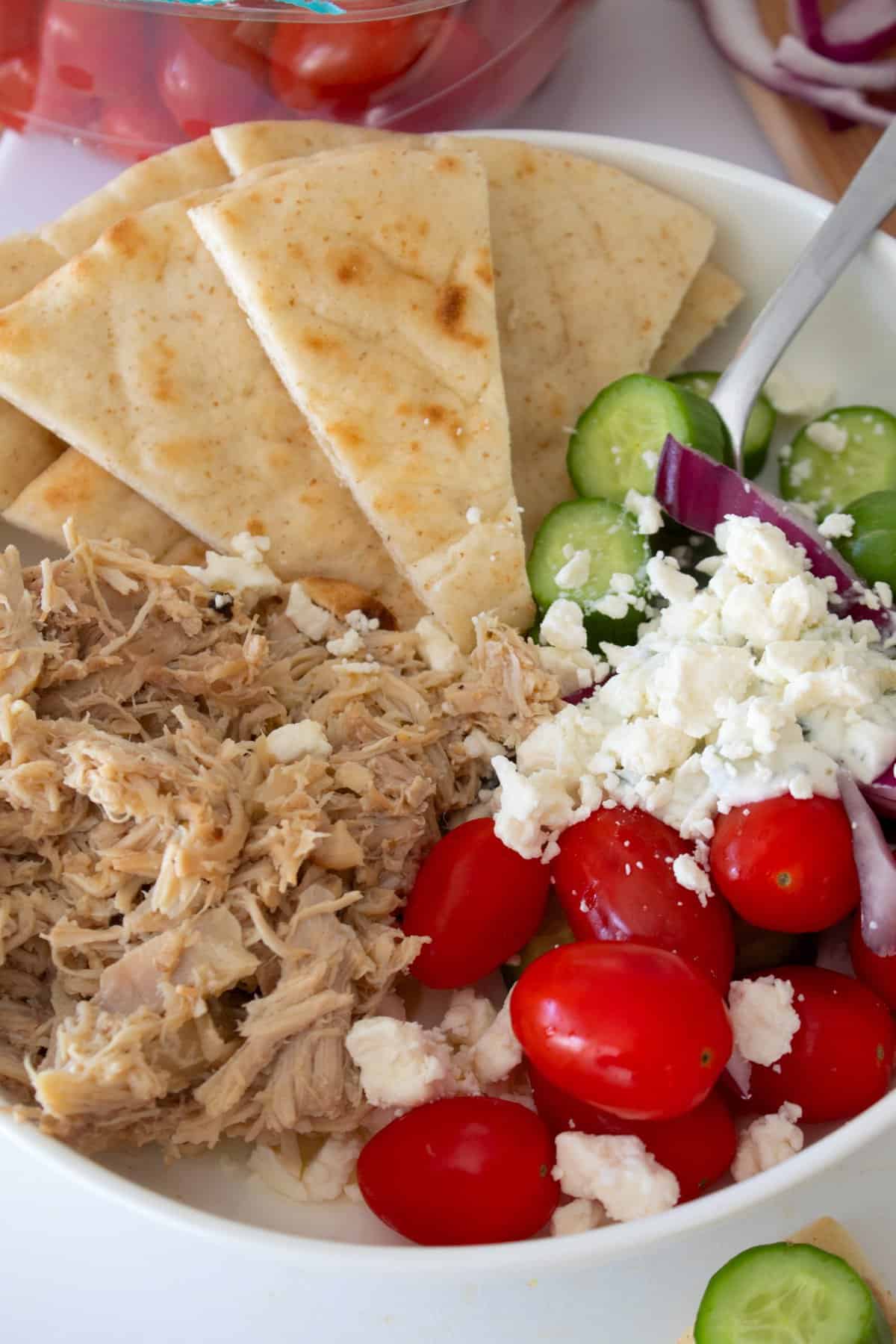 plate of greek slow cooker chicken