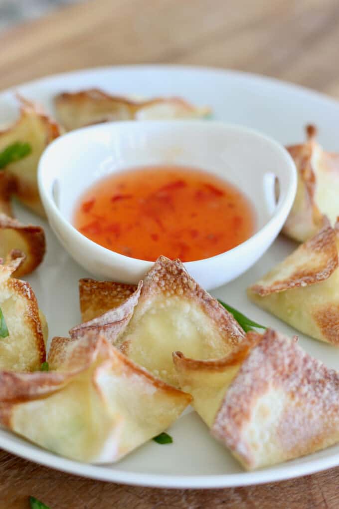 stuffed wontons on a white plate