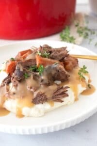 plated pot roast with gravy on a plate