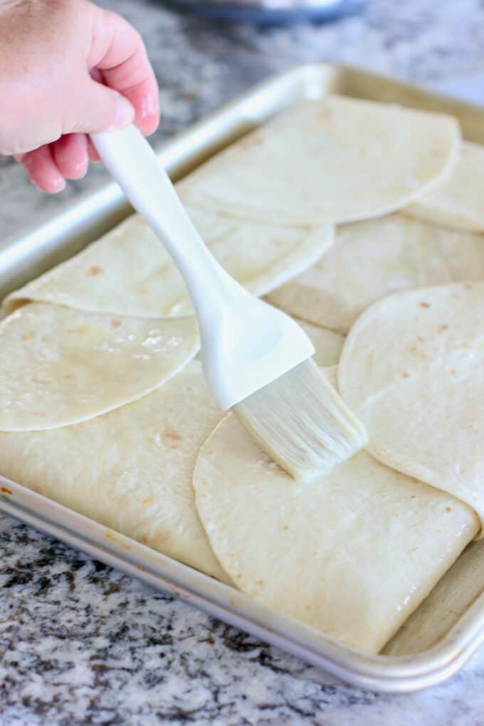 folding over tortilla over quesadilla