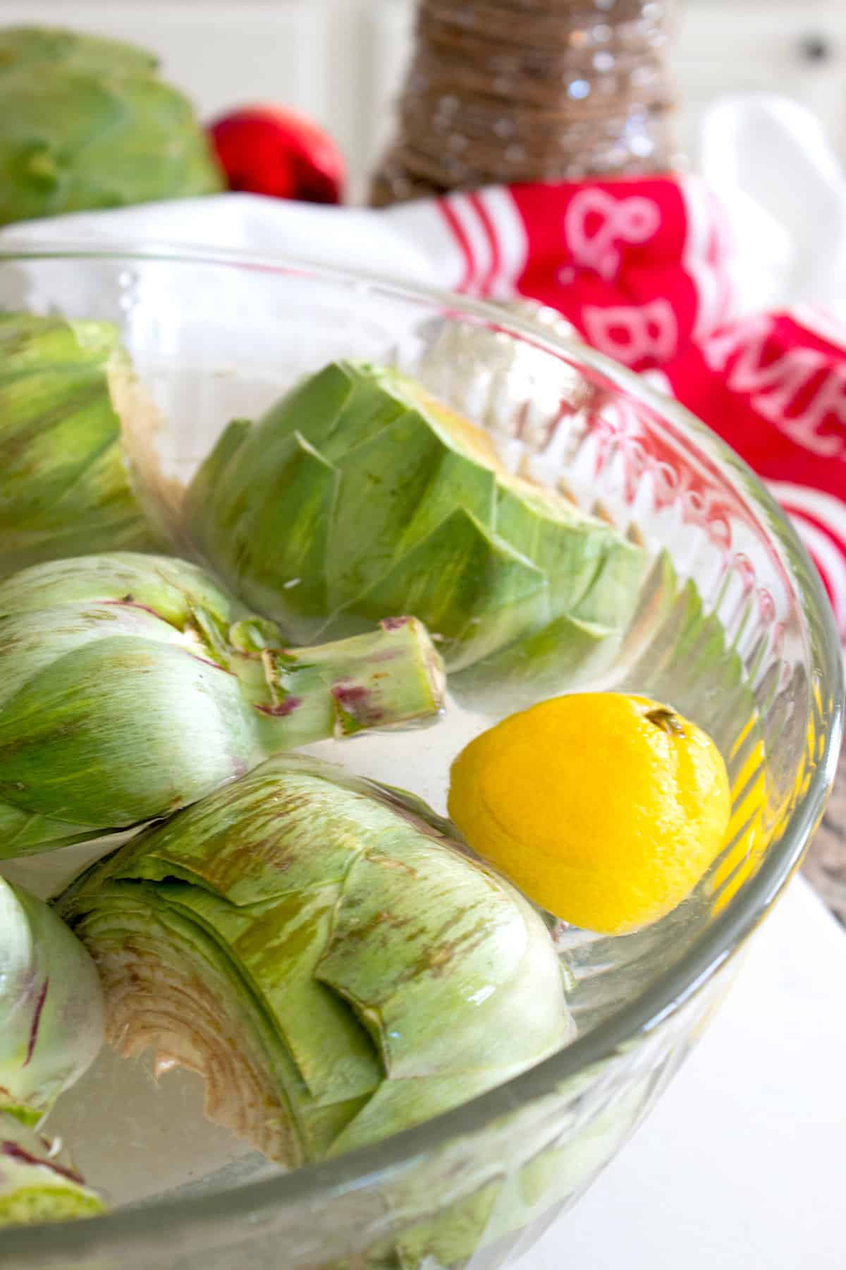 artichokes soaking in water