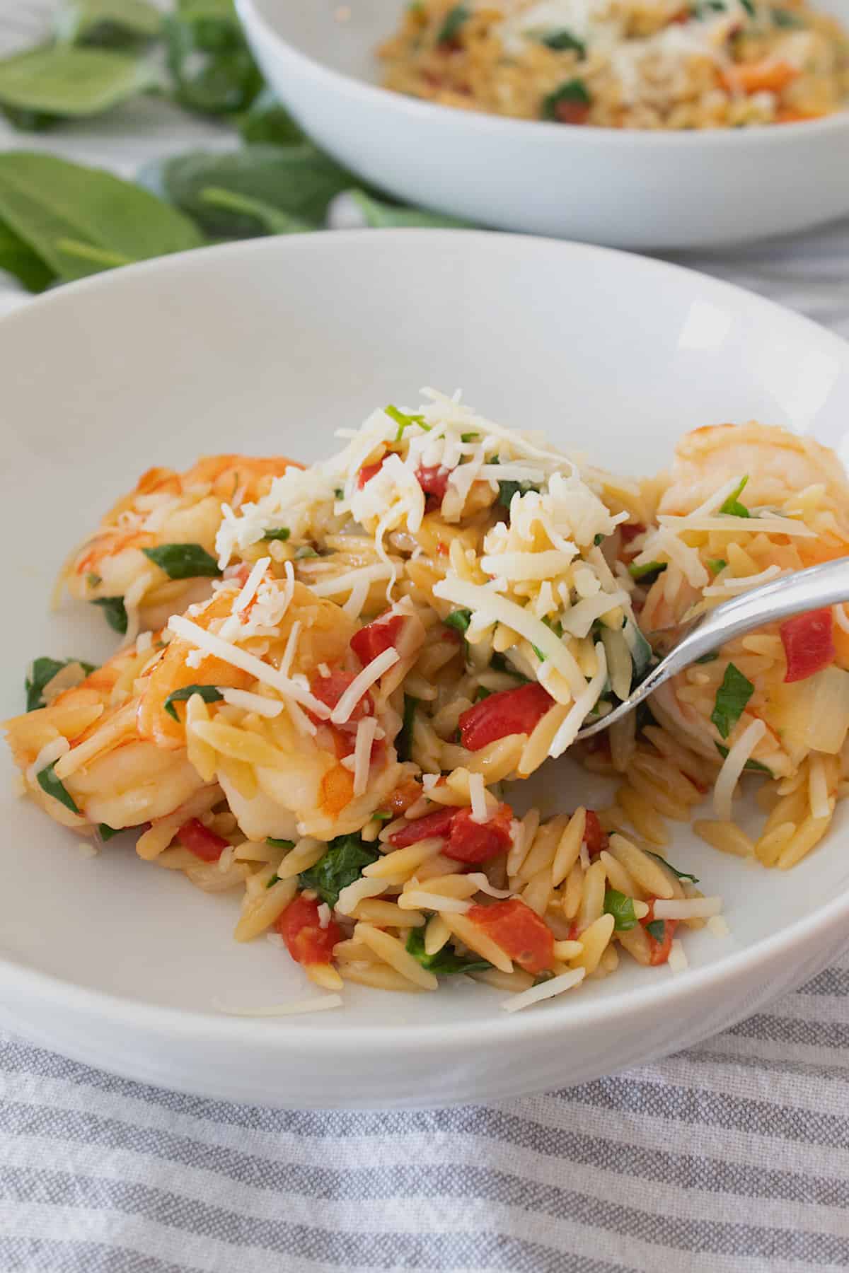 bowl of tuscan orzo shrimp dinner