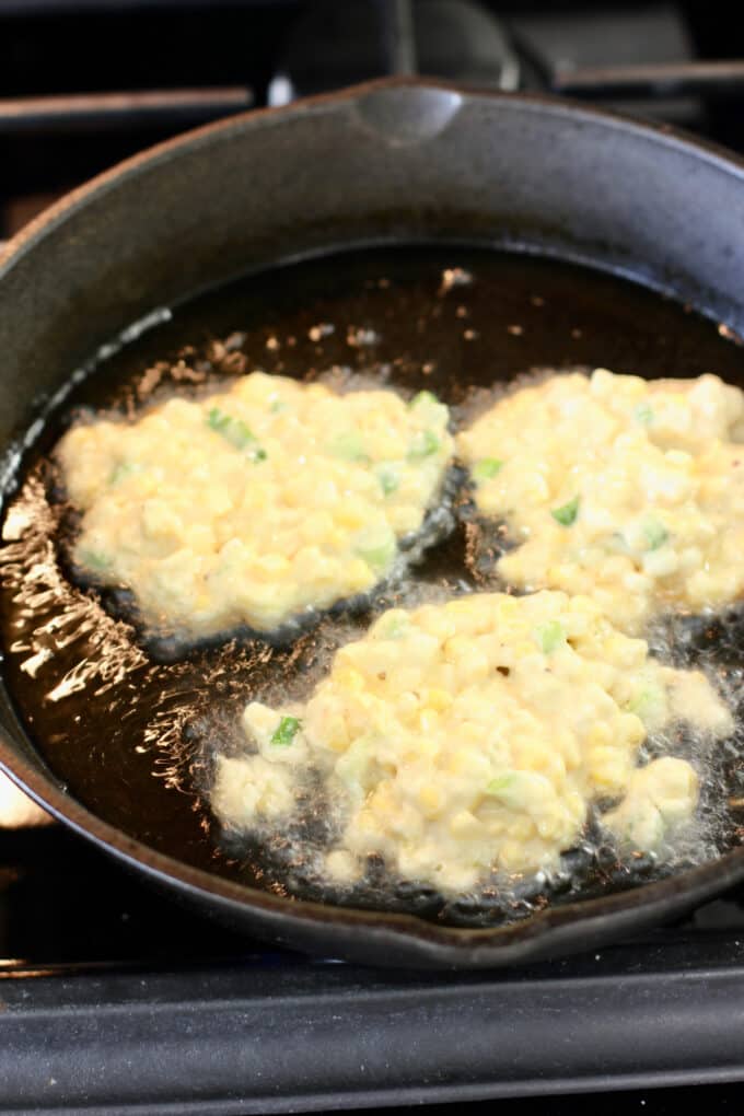 dropping fritters into skillet