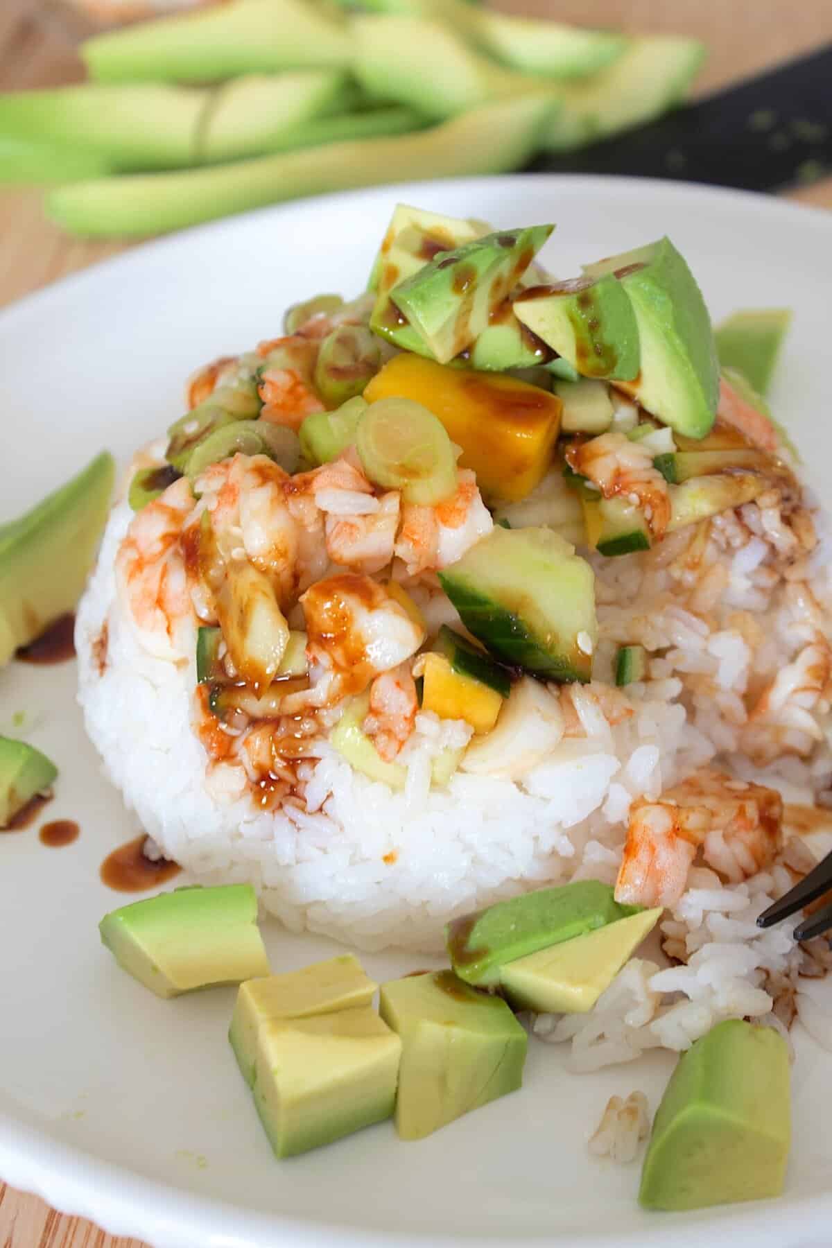 overhead view of sushi stack with avocado