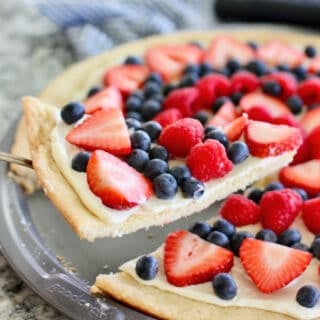 sliced fruit pizza ready to eat