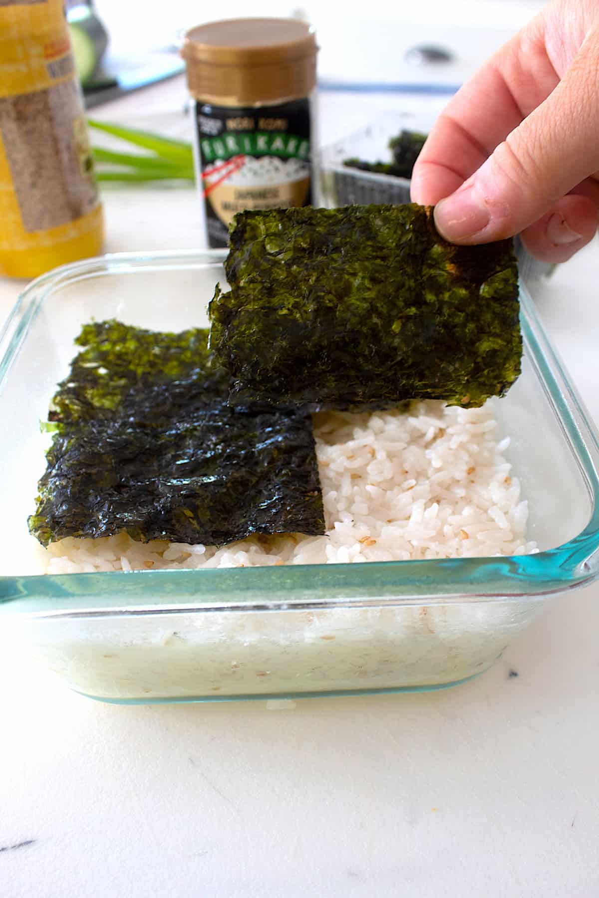 layering white rice and nori