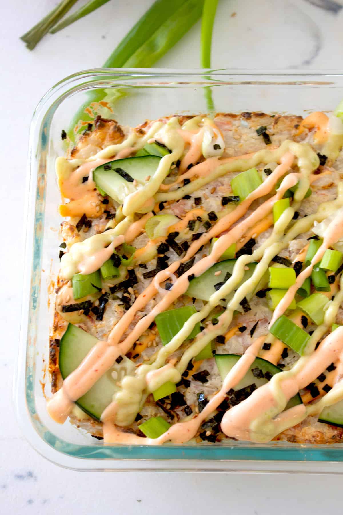 overhead view of sushi bake with toppings