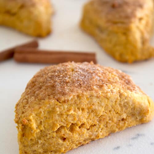 https://laughingspatula.com/wp-content/uploads/2023/09/pumpkni-scone-hero-pic-2-500x500.jpg