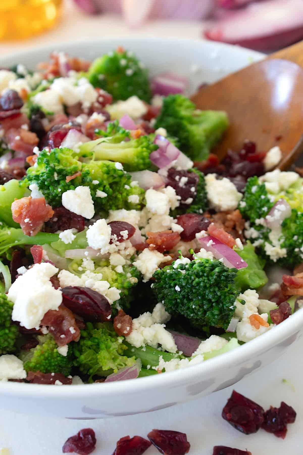 broccoli salad in a bowl with feta cheese