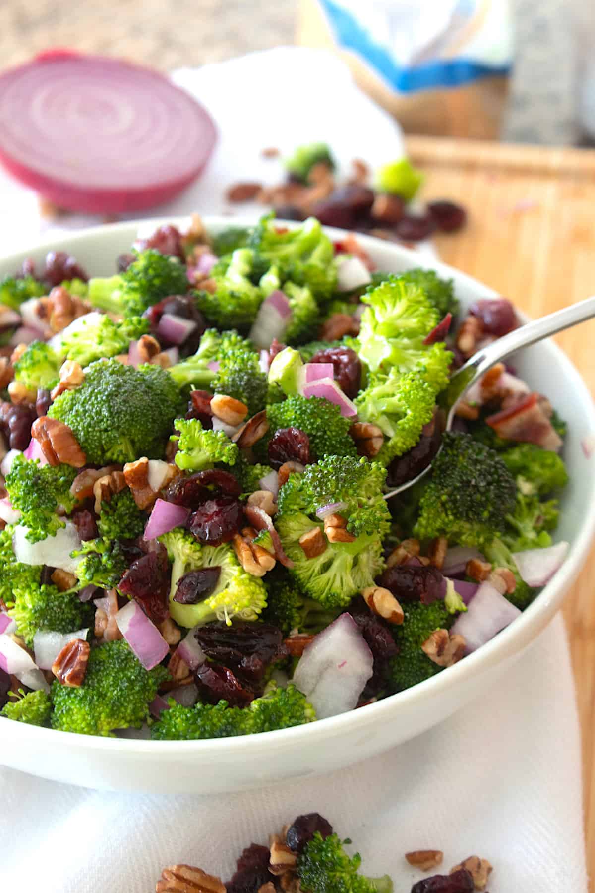 broccoli salad in a white bowl
