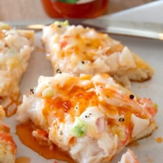 crab rangoon pizza with Thai chili sauce