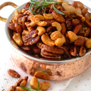 honey roasted nuts in copper bowl