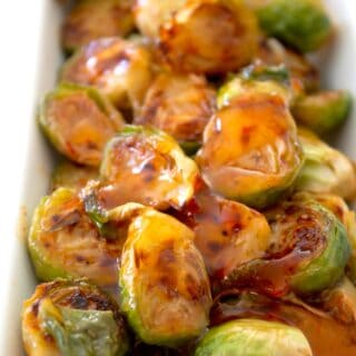 front view of Thai chili Brussel sprouts in a dish
