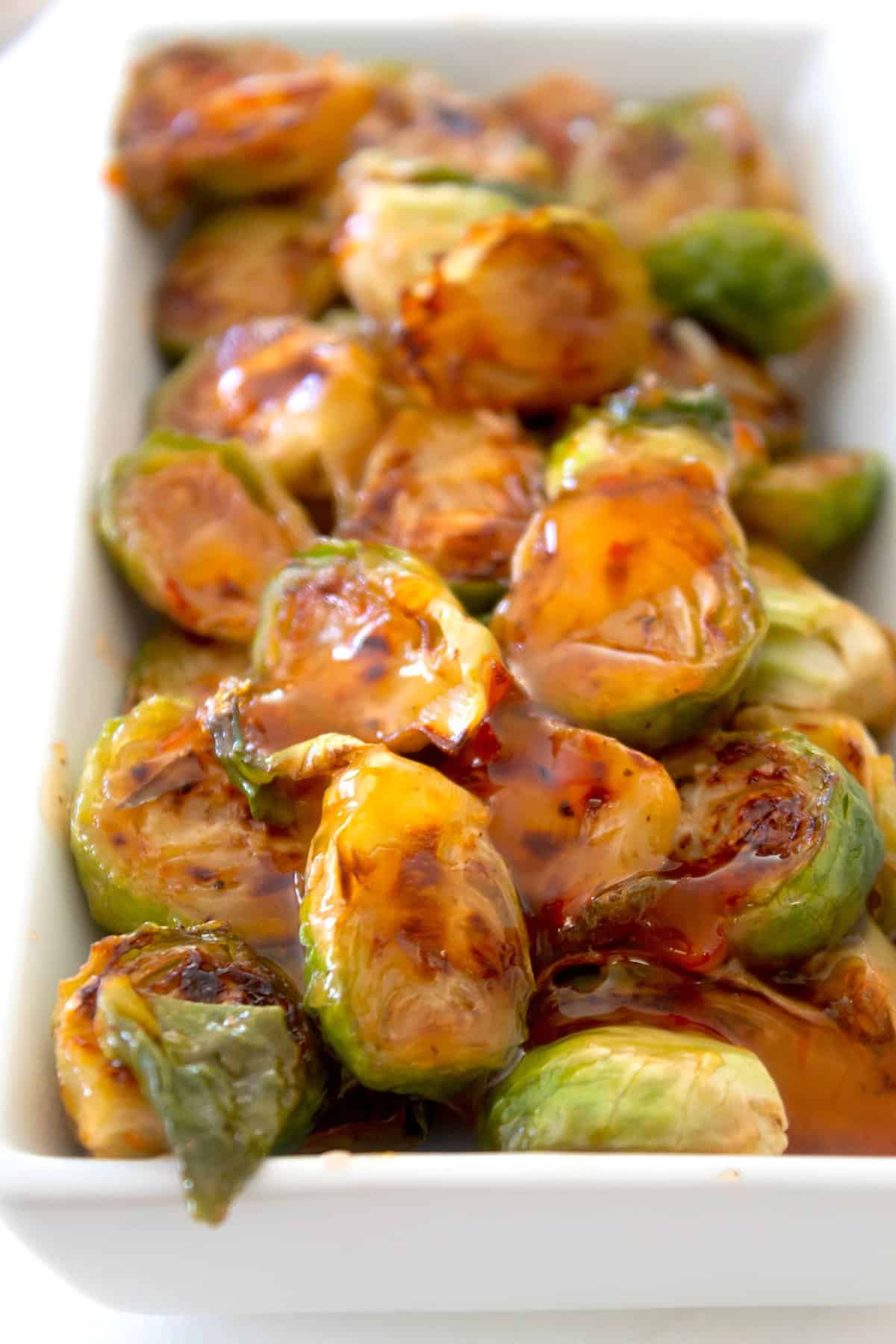 front view of Thai chili Brussel sprouts in a dish