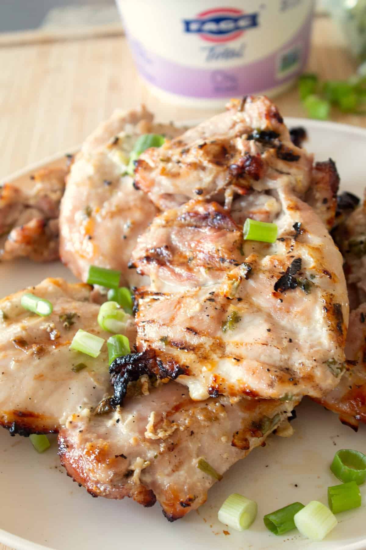 overhead view of chicken with yogurt in background